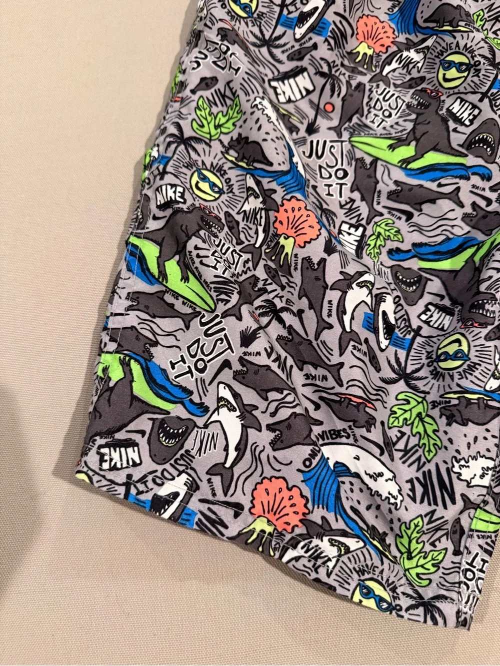 Nike Kids Gray Swim Trunks with Bright Graphic Print